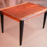 sapele_dining_table_with_black_laquer_base.jpg