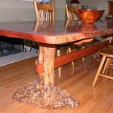 sapele_dining_table_with_buckeye_burl_trestle_base_1.jpg