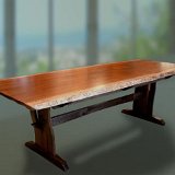 sapele_dining_table_with_curved_walnut_base.jpg